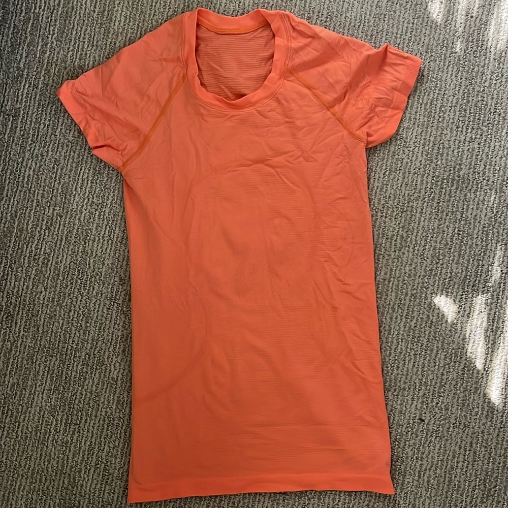 orange swiftly tank slightly used
